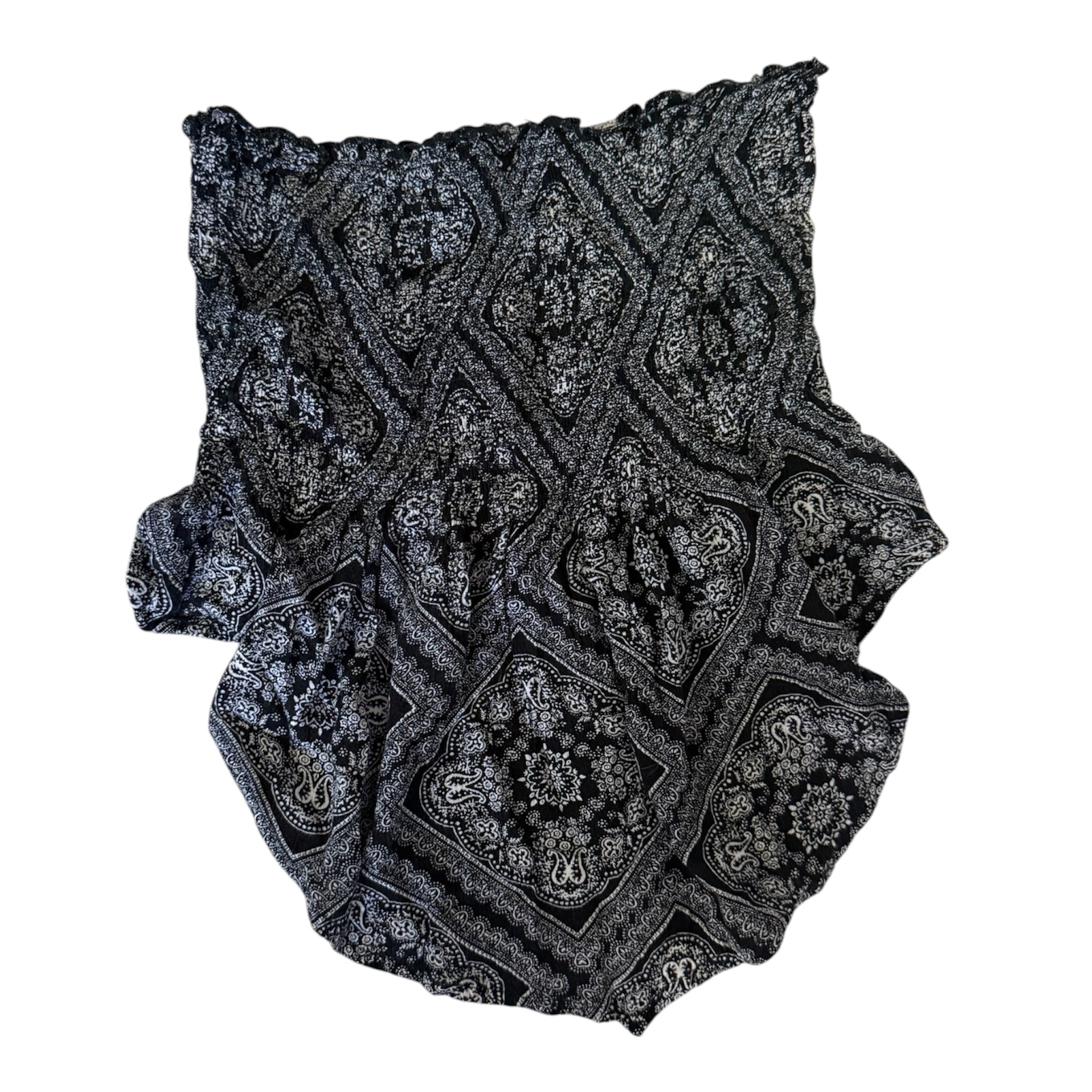black and white paisley print top with ruffle details