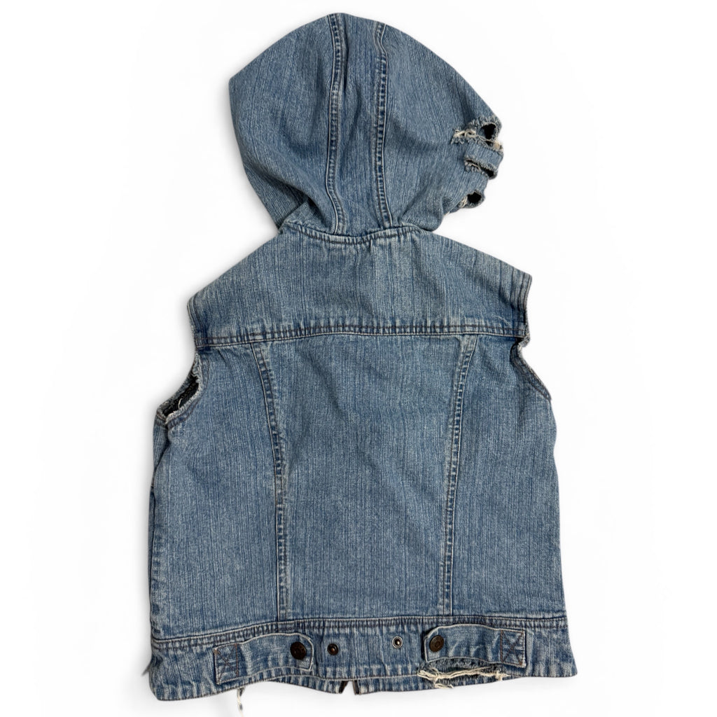 denim vest with pink accents